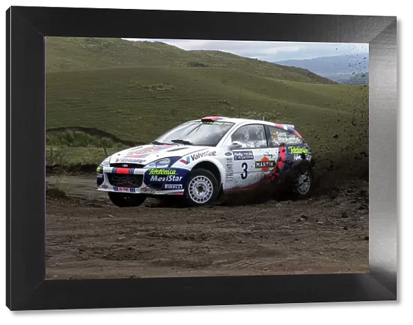 2001 World Rally Championship. Argentina May 3rd-6th, 2001 Carlos Sainz kicks up the dirt on stage seven. Photo: Ralph Hardwick / LAT