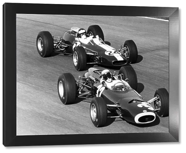 1965 Italian Grand Prix - Jackie Stewart and Jim Clark: Jackie Stewart, BRM P261, 1st position, leads Jim Clark, Lotus 33-Climax, 10th position