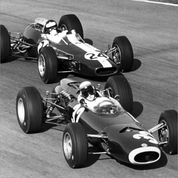 1965 Italian Grand Prix - Jackie Stewart and Jim Clark: Jackie Stewart, BRM P261, 1st position, leads Jim Clark, Lotus 33-Climax, 10th position