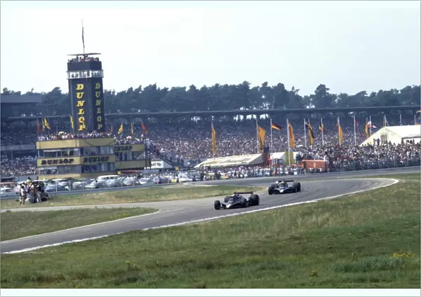1978 German Grand Prix - Mario Andretti and Ronnie Peterson: Mario Andretti, 1st position, leads Ronnie Peterson, retired, action