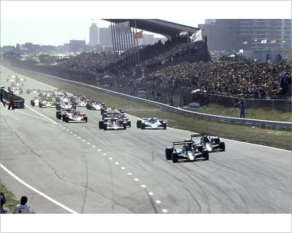 1978 Dutch Grand Prix - Start: Mario Andretti, 1st position, leads Ronnie Peterson, 2nd position, at the start, action