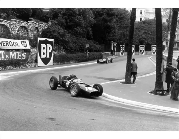 1962_17: Graham Hill leads Jim Clark into the Old Station Hairpin. Hill finished in 6th position