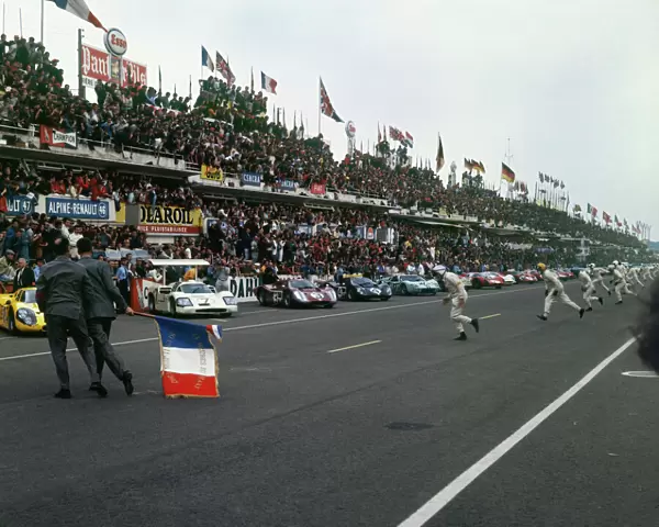 1967 Le Mans 24 Hours - Start: Drivers run to their cars at the start of the race, action