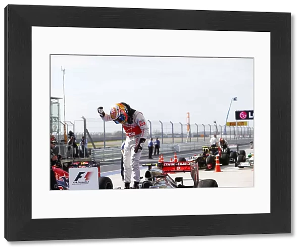 Formula One World Championship: Race winner Lewis Hamilton McLaren MP4-27 celebrates in parc ferme