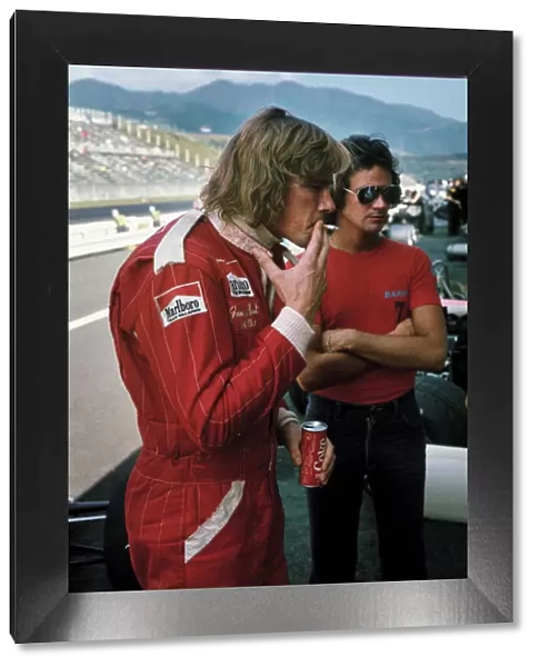 1976 Japanese Grand Prix: James Hunt with 500cc motorcycle rider Barry Sheene, portrait