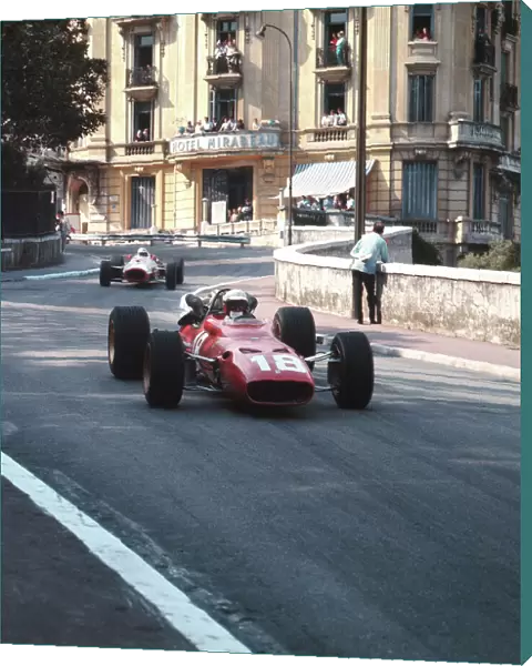 1967 Monaco Grand Prix: Lorenzo Bandini leads John Surtees. Bandini later crashed suffering fatal injuries