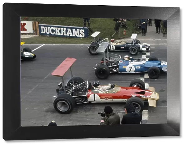 1969 Race of Champions: B to T: Graham Hill, 2nd position, Jackie Stewart, 1st position, Jo Siffert, 4th position, lead from the start, action