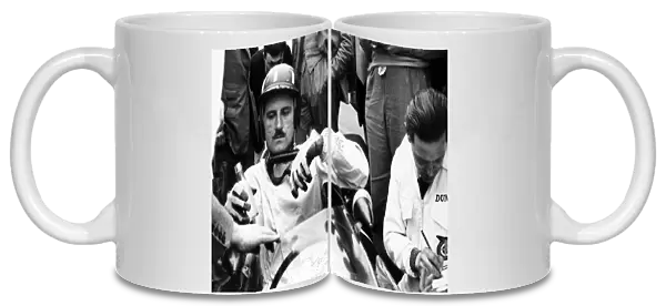 Zandvoort, Holland. 18-20 May 1962: Graham Hill, 1st position, recieves a drink in parc ferme, portrait