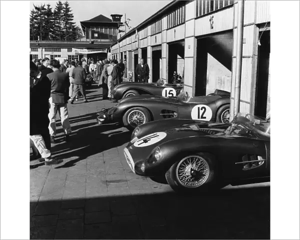 1957 Nurburgring 1000 kms: The Tony Brooks  /  Noel Cunningham-Reid, 1st position in the garages along side the Roy Salvadori  /  Les Leston, 6th position
