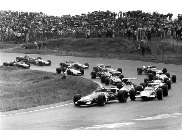 Zandvoort, Holland. 23 June 1968: Jochen Rindt, Brabham BT26-Repco, retired, leads Graham Hill, Lotus 49B-Ford, 9th position, Chris Amon, Ferrari 312