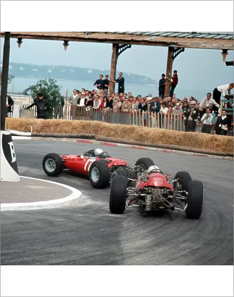 1965 Monaco Grand Prix: Lorenzo Bandini leads John Surtees in station hairpin. They finished in 2nd and 4th positions respectively