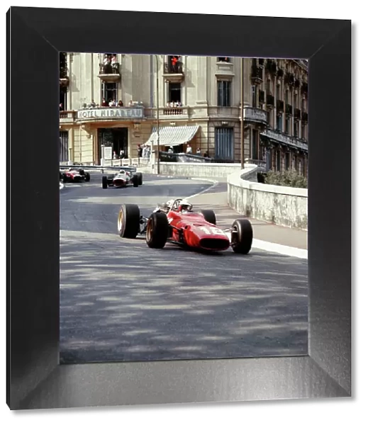 1967 Monaco Grand Prix: Lorenzo Bandini leads John Surtees. Bandini later crashed suffering fatal injuries