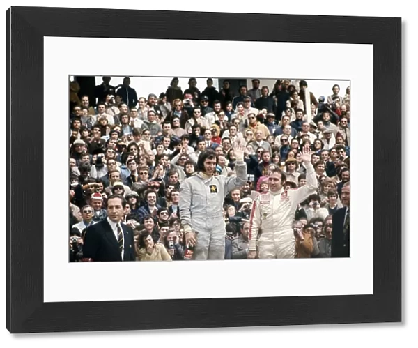 1972 Spanish Grand Prix: Emerson Fittipaldi, 1st position and Clay Regazzoni, 3rd position on the podium, portrait