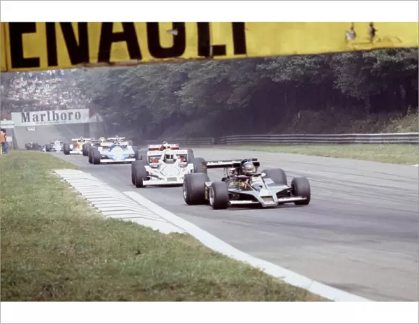 Monza, Italy. September 1978: Ronnie Peterson leads Alan Jones and the rest of the field on the race warm-up lap