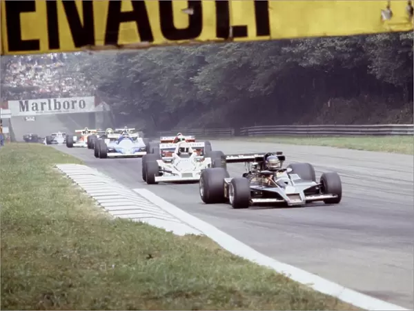 Monza, Italy. September 1978: Ronnie Peterson leads Alan Jones and the rest of the field on the race warm-up lap