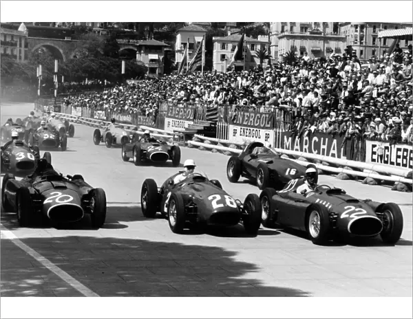 Monte Carlo, Monaco. 13 May 1956: Eugenio Castellotti, #22 Lancia-Ferrari D50, retired, leads Stirling Moss, #28 Maserati 250F, 1st position