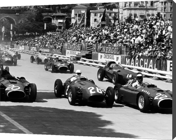 Monte Carlo, Monaco. 13 May 1956: Eugenio Castellotti, #22 Lancia-Ferrari D50, retired, leads Stirling Moss, #28 Maserati 250F, 1st position