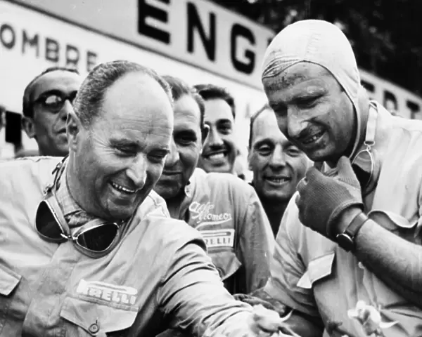 1950 Belgian Grand Prix - Podium: Juan Manuel Fangio and Luigi Fagioli after finishing in 1st and 2nd positions respectively
