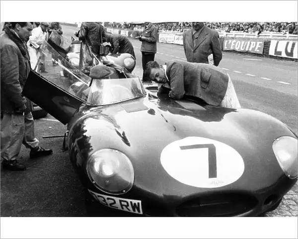 Le Mans, France. 11-12 June 1955: Tony Rolt  /  Duncan Hamilton, retired, in the pits, action