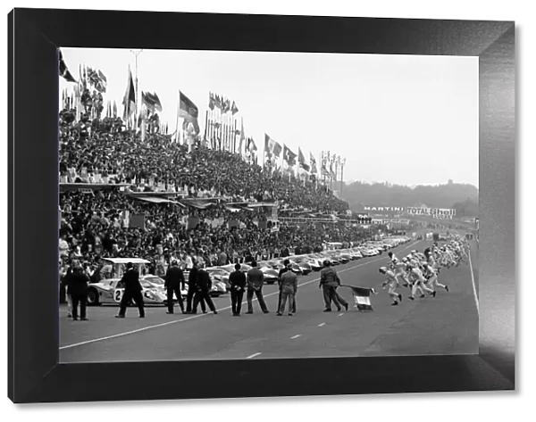 1967 Le Mans 24 hours: Drivers run to their cars at the start of the race, action