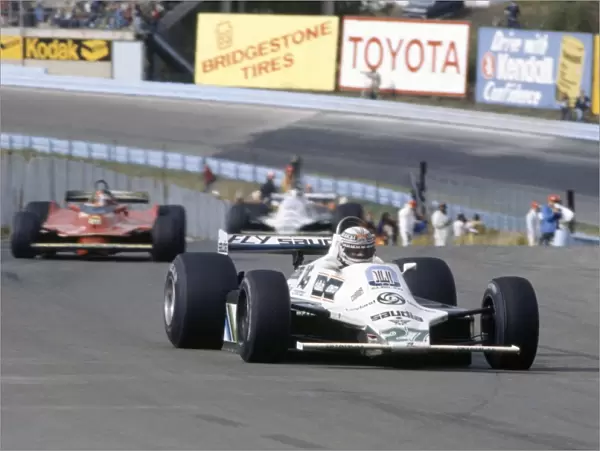 1980 United States Grand Prix: Alan Jones leads Gilles Villeneuve and Carlos Reutemann