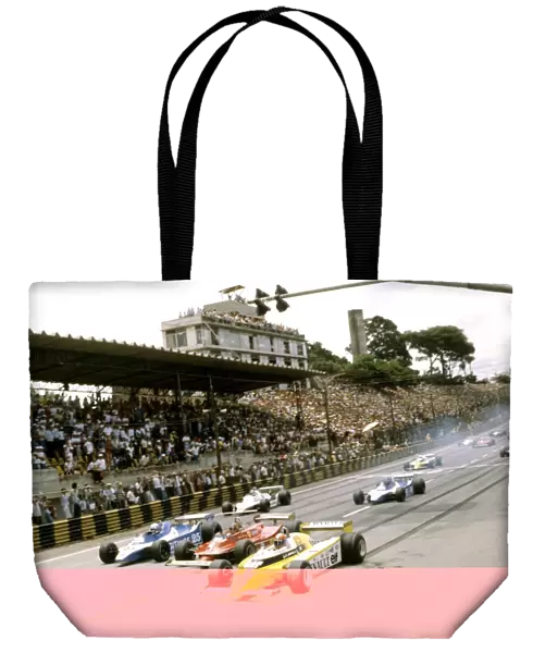 Interlagos, Brazil. 27 January 1980: Jean-Pierre Jabouille, Renault RE20, retired, leads Didier Pironi, Ligier JS11  /  15-Ford, 4th position, Gilles Villeneuve