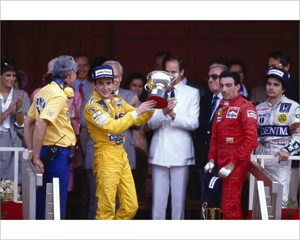 1987 Monaco Grand Prix: Ayrton Senna 1st position, Michele Alboreto 3rd position and Nelsoon Piquet 2nd position on the podium