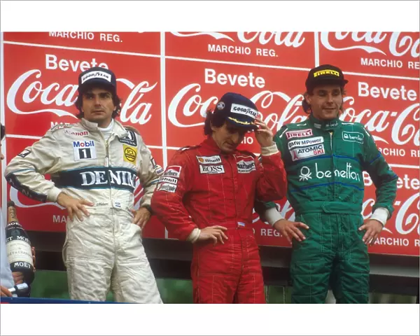 1986 San Marino Grand Prix: Alain Prost 1st position, Nelson Piquet 2nd position and Gerhard Berger 3rd position on the podium