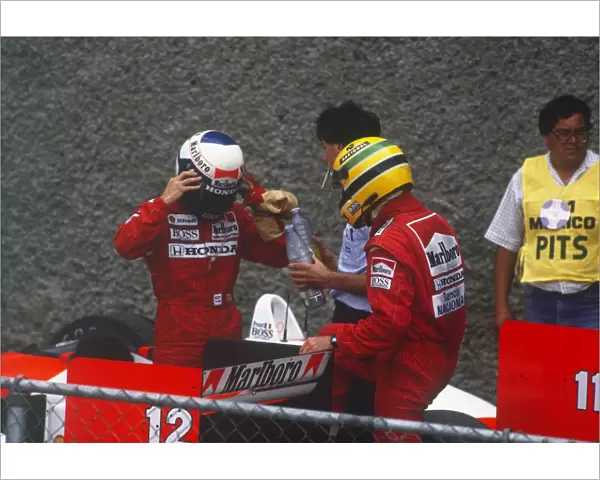 1988 Mexican Grand Prix: Ayrton Senna, 2nd position and Alain Prost 1st position, in parc ferme, portrait
