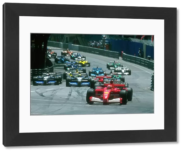 2001 Monaco Grand Prix: Michael Schumacher, Ferrari F2001, makes the best start from the grid into Ste Devote
