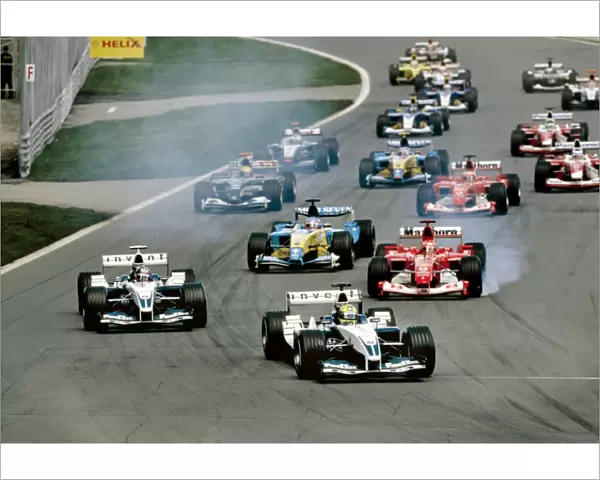 Montreal, Canada. 13th - 15th June 2003: Ralf Schumacher, BMW Williams FW25, leads at the start of the race