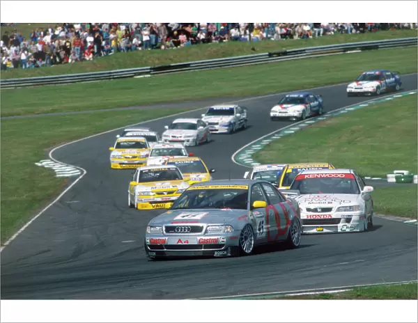 1996 British Touring Car Championship: Frank Biela, 1st position, leads the field at the start, action