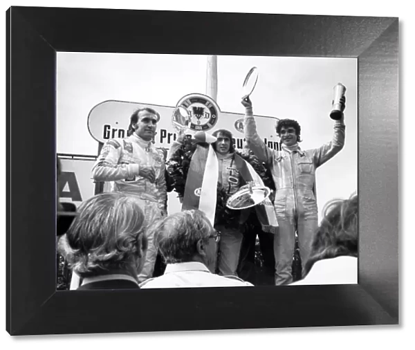 Nurburgring, Germany. 29th July - 1st August 1971: Jackie Stewart 1st position, Francois Cevert 2nd position and Clay Regazzoni 3rd position, podium