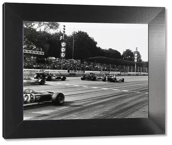 Monza, Italy. 5 September 1971: Peter Gethin, Ronnie Peterson, Francois Cevert, Mike Hailwood and Howden Ganley cross the line with Gethin just