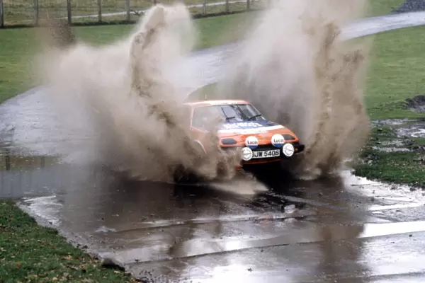 1978 FIA World Rally Championship: Tony Pond  /  Fred Gallagher speed through a water plash in their Triumph TR7 V8. Action