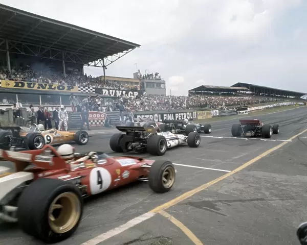 1970 British Grand Prix: Jochen Rindt, Lotus 72-Ford, 1st position, Jack Brabham, Brabham BT33-Ford, 2nd position, and Jacky Ickx, Ferrari 312B