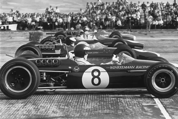 1967 Tulln-Langenlebarn Formula Two: Jochen Rindt, 1st position, on the start line next to Jim Clark, retired, Jack Brabham, 2nd position