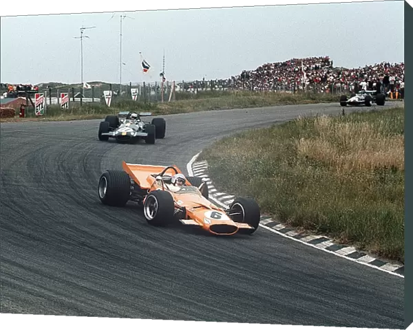 1969 Dutch Grand Prix: Bruce McLaren leads Jack Brabham and Jacky Ickx