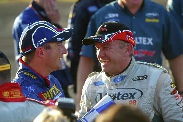 05av808. L-R: Marcos Ambrose (AUS) and Russell Ingall 