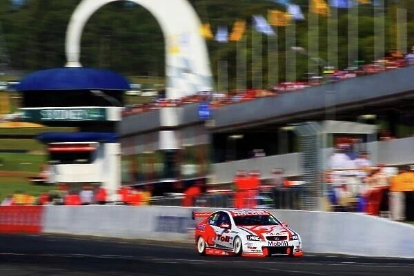 08av802. Garth Tander (AUS), Toll HSV Commodore, won race 1 but was 3rd outright.