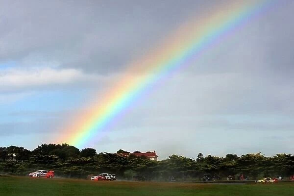 08av810. Glenn Seton (aust) Toll HRT Commodore, runs under the rainbow