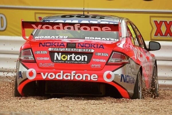 09av803. Craig Lowndes (AUS) Team Vodafone 888 Ford in the gravel trap.