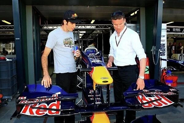 09av8sgc. Rick Kelly (AUS) Jack Daniels Racing Commodore visited the Red Bull garage