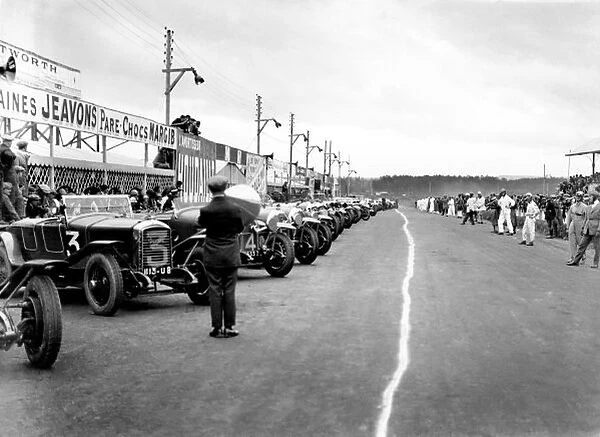 1926 Le Mans 24 hours: Drivers line up for the start. Peugeot 174S and 3rd place finisher Lorraine-Dietrich B3-6 are in the foreground. Atmosphere