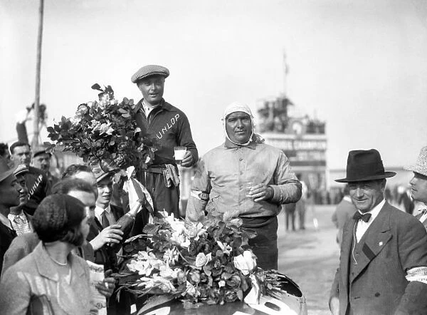 1931 French Grand Prix. Montlhery, France: Baconin Borzacchini  /  Giuseppe Campari, Alfa Romeo 8C Monza, 2nd position, portrait, podium