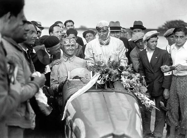 1931 French Grand Prix. Montlhery, France. 21 June 1931. Louis Chiron (left) / Achille Varzi, Bugatti T51, 1st position, portrait, podium. World Copyright: LAT Photographic Ref: B6566