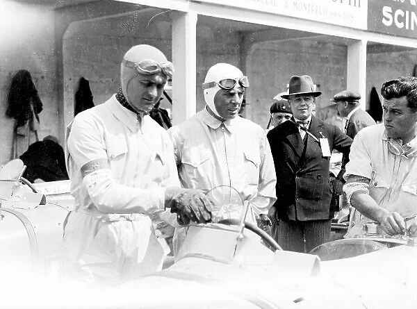 1931 French Grand Prix, Montlhery Louis Chiron (left) and Achille Varzi (shared Bugatti T51) 1st position Portrait in pits World LAT Photographic Tel: +44 (0) 181 251 3000 Fax: +44 (0) 181 251 3001 Somerset House, Somerset Road, Teddingto