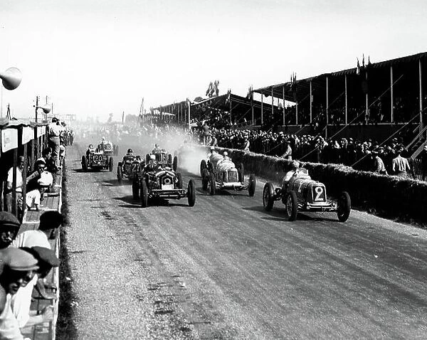 1934 Dieppe Grand Prix. Dieppe, France. 20-22 July 1934. Philippe Etancelin (Maserati 8CM, number 2) leads at the start of the first heat. He finished in 1st position