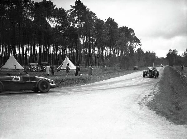 1935 Le Mans 24 hours. Le Mans, France. 15-16 June 1935. Charles Martin / Charles Brackenbury (Aston Martin Ulster), 3rd position, leads John Hindmarsh / Luis Fontes (Lagonda Rapide), 1st position. World Copyright: LAT Photographic Ref: Autocar C6507