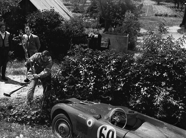 1951 Le Mans 24 hours: Jean de Montremy  /  Jean Hemard. 25th position, goes off into the bushes and the driver tries to hack away to get the car back on track